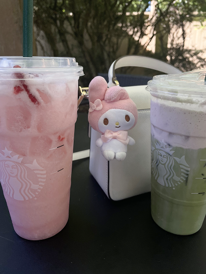A cup of matcha latte on a table