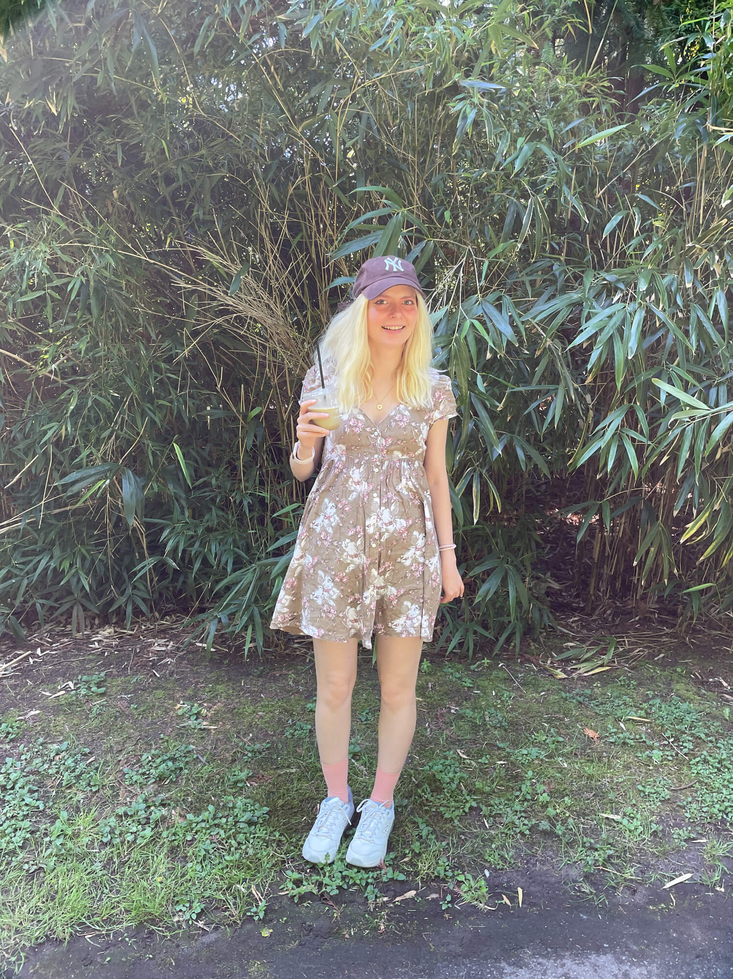 Michelle walking outside on a sunny day